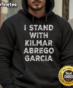 Nice I Stand With Kilmar Abrego Garcia Bring Kilmar Home hoodie worn by a supporter at a rally for justice.