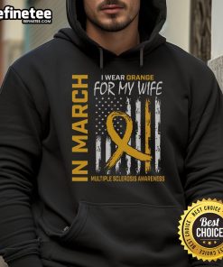 Man wearing an orange hoodie with a Multiple Sclerosis flag, promoting awareness in March for his wife.