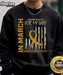 Man wearing an orange sweatshirt with Multiple Sclerosis flag in March, supporting his wife.