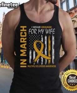 Man wearing orange tank top with Multiple Sclerosis flag design to support his wife in Nice, March.