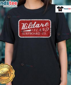 Boy in retro hat on Kildare Island with surfboard, showcasing Nice Kildare Island style in a trendy ladies tee.