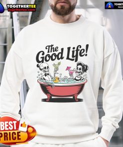Skeletons enjoying the good life in a bathtub, sipping drinks in a vacation sweatshirt, embodying fun and relaxation.
