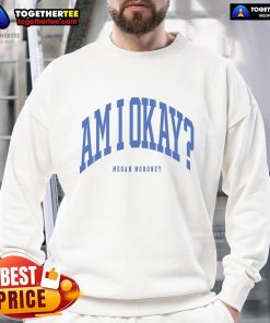 Alt Text: Megan Moroney wearing a stylish 'Am I OK' sweatshirt, showcasing trendy fashion and vibrant colors.