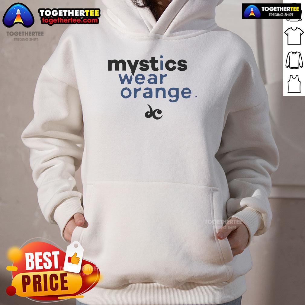 Nice Mystics Wear Orange Hoodie Nice Mystics wearing an orange hoodie, showcasing vibrant street style and cozy fashion in a casual outdoor setting.