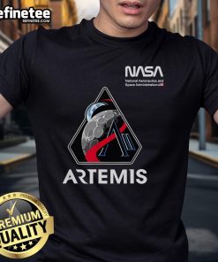 NASA Artemis II mission patch worm logo on an American flag t-shirt, showcasing space exploration pride.