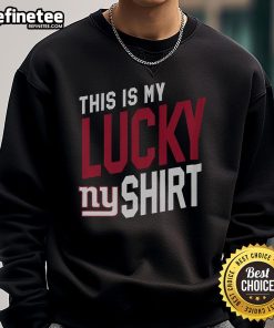 Person wearing a lucky New York Giants sweatshirt, showcasing team pride and style on game day.