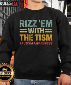 Funny autism awareness sweatshirt featuring 'Nice Rizz Em With The Tism' slogan, perfect for spreading awareness and humor.