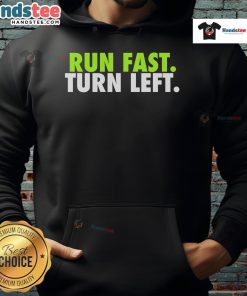 Funny track runner in motivational hoodie says 'Nice Run Fast Turn Left' during a race, inspiring athletes to push limits.