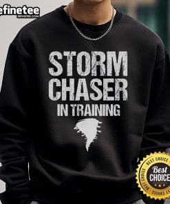 Nice storm chaser in training wearing a meteorologist sweatshirt, showcasing passion for weather and storm chasing.