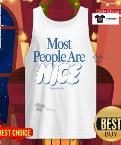 Nice Tanner Smith wearing a 'Most People Are Nice' tank top, showcasing a positive message and casual style.