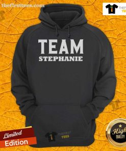 Stephanie wearing a Nice Team hoodie, showcasing team spirit and support for Stephanie in a vibrant setting.