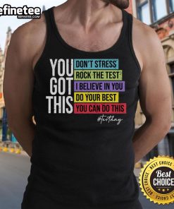 Teacher wearing 'Rock The Test' tank top on testing day, inspiring students with positive vibes and motivation.