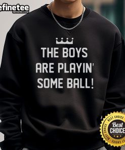 Nice The Boy playing ball in a stylish sweatshirt, showcasing fun outdoor activities and trendy sportswear.