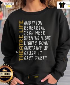 Actor in a Nice Theatre sweatshirt, showcasing passion for acting and directing in a vibrant stage play performance.