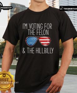 Alt Text: Funny Trump meme t-shirt design: 'I'm Voting For The Felon The Hillbilly' showcasing humor in political apparel.