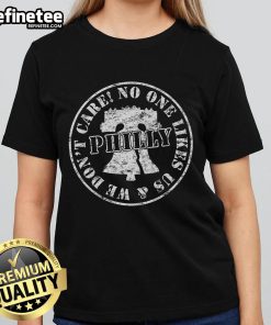 Vintage Philadelphia ladies tee with 'No One Likes Us, We Dont Care' slogan, perfect for casual wear and sports fans.