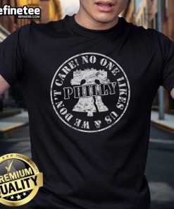 Vintage 'No One Likes Us We Don't Care' Philadelphia T-Shirt showcasing a classic design for proud Philly fans.