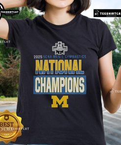 Alt Text: 2025 NCAA Men's Gymnastics National Champions Ladies Tee featuring Nice Wolverines logo and design.