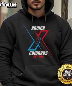 Alt Text: Xavier Edwards wearing a stylish hoodie, showcasing his fashion sense and personal style in a casual setting.