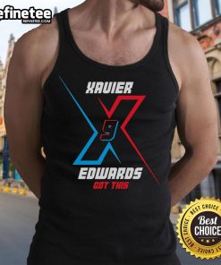 Xavier Edwards wearing a stylish tank top, showcasing a trendy look perfect for summer fashion.