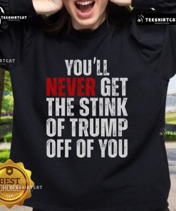 Funny 'You'll Never Get The Stink Of Trump Off Of You' sweatshirt design featuring humorous text and vibrant colors.
