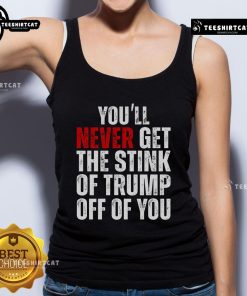 Trendy 'Trump Smells' tank top featuring bold text, perfect for showcasing your unique style and humor about Trump.