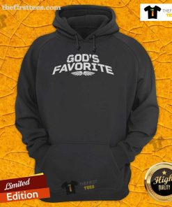 Officer Eudy wearing 'God's Favorite Hoodie', showcasing a stylish design and vibrant colors in an urban setting.