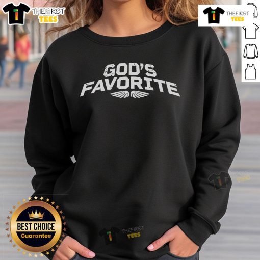 Officer Eudy wearing 'God's Favorite' sweatshirt, showcasing a stylish and meaningful design for faith-inspired fashion.