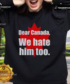 Alt Text: Official Dear Canada We Hate Him Too Sweatshirt featuring bold text design on a cozy pullover.