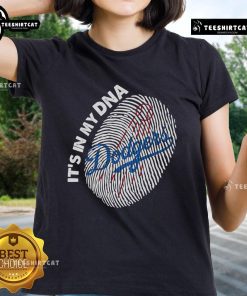 Los Angeles Dodgers ladies tee featuring 'It's in My DNA' design with a fingerprint graphic. Perfect for fans!