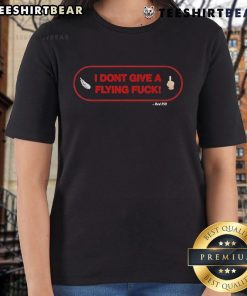 Alt Text: Official I Don't Give A Flying F*ck Red Pill Ladies Tee featuring bold graphic design on a stylish women's shirt.