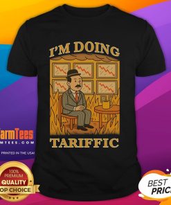 Official I'M Doing Tariffic This Is Fine Meme T-Shirt featuring the iconic meme graphic and vibrant colors.