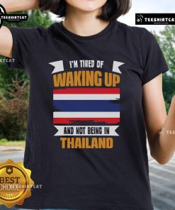 Official 'I'm Tired of Waking Up and Not Being in Thailand' ladies tee featuring a fun travel-themed design.