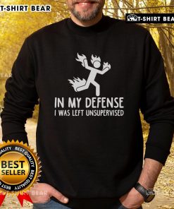 Official 'In My Defense I Was Left Unsupervised' Burning Stickman Sweatshirt design showcasing playful graphics and text.