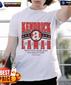 Official Kendrick Lamar 'They Tried To Rig The Game' T-Shirt showcasing unique design and powerful message about influence.