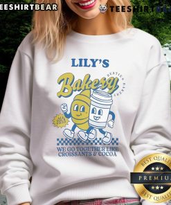 Cozy 'We Go Together Like Croissants And Cocoa' sweatshirt from Official Lily's Bakery, perfect for food lovers.