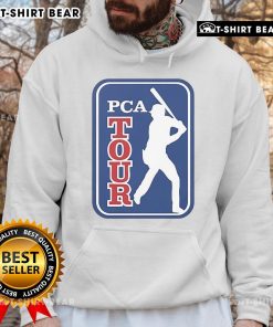 Alt Text: Pete Crow-Armstrong wearing an Official PCA Tour hoodie, showcasing team spirit and style on the field.