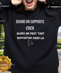Official Quand On Supporte Coco sweatshirt featuring motivational quote for life, perfect for casual wear enthusiasts.