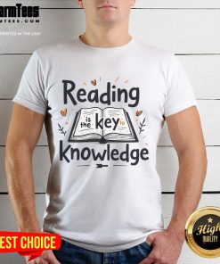 Official Reading Is The Key Knowledge T-Shirt featuring a bold design promoting literacy and education.