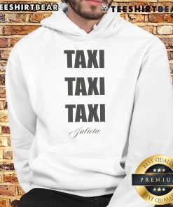 Sabrina Carpenter wearing the official Taxi Taxi Taxi Julieta hoodie, showcasing stylish design and vibrant colors.