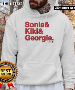 Sonia Citron, Kiki Iriafen, and Georgia Amoore wear Washington Ampersand Hoodie, showcasing team spirit and style.