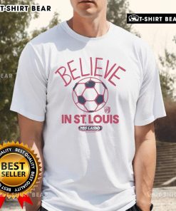 Official Ted Lasso Believe X St Louis City SC T-Shirt featuring vibrant design and team logo for fans and supporters.