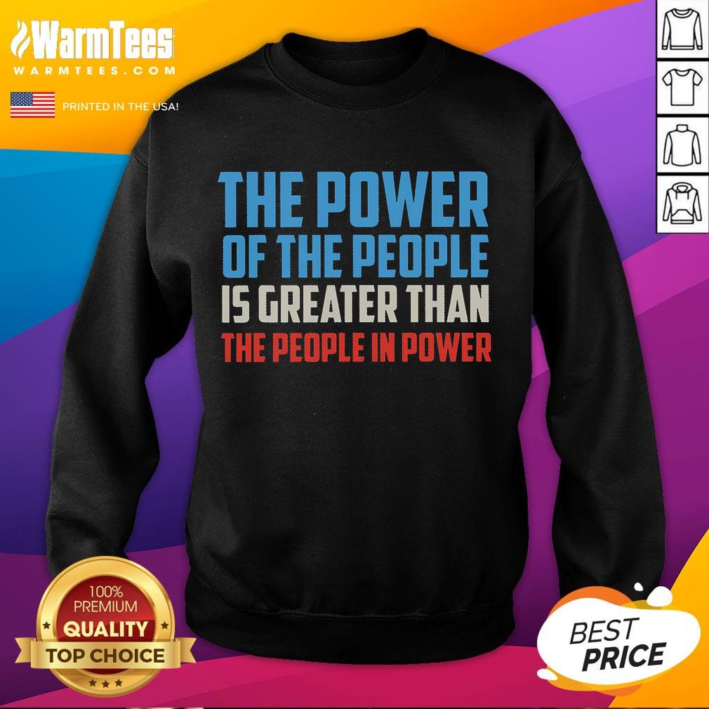 Official The Power Of The People Is Greater Than The People In Power Sweatshirt Alt Text: Cozy sweatshirt featuring The Power Of The People Is Greater Than The People In Power slogan for activism.