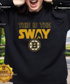 Alt Text: Official This Is The Sway Boston Bruins Logo Sweatshirt featuring a bold team logo on a stylish design.