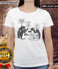 Women in 'Make Fish Cheap Again' tees protest against tariffs on Antarctic exports, highlighting unfair trade issues.