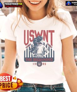 Official USWNT The Beginning 1985 Ladies Tee featuring vintage design and vibrant colors celebrating women's soccer history.