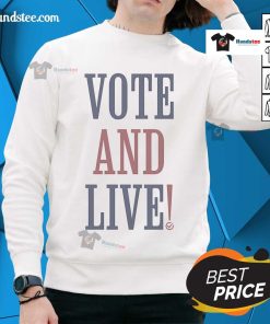 Official Vote and Live Turning Point USA (TPUSA) sweatshirt showcasing patriotic design and branding.