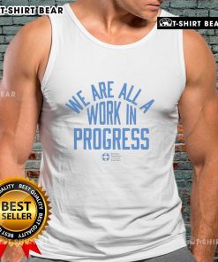 Alt Text: We Are All A Work In Progress tank top by AFSP - American Foundation for Suicide Prevention promoting mental health awareness.