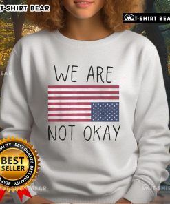We Are Not Ok America sweatshirt featuring an upside-down flag and patriotic saying for a bold statement.