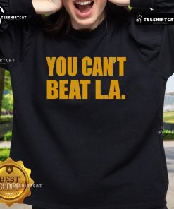 Official 'You Can't Beat LA' sweatshirt design featuring bold lettering on a stylish black background.